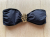 Trina Turk Bond girl style!  Black bikini with gold accents