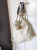 Jimmy Choo Ivory and black bag, gold and silver studded