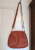 Jimmy Choo Rust-colored grained shoulder bag/pouch