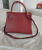 Hermès Kelly Bag 28 cm Kalbsleder Togo granatrot