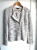 CAROLL Paris Melierte Strickjacke