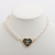 Chanel CC Metal Necklace Heart and Pearls Gold